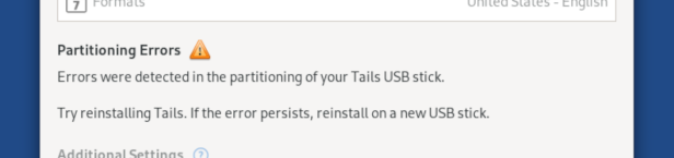 Warning in the Welcome Screen: Errors were detected in the partitioning of your Tails USB stick.